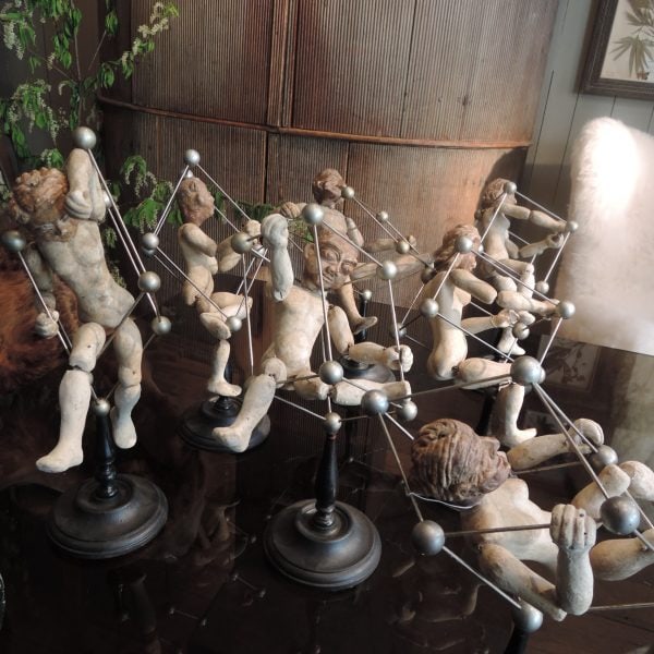 COLLECTION OF ITALIAN PUPPETS IN PLASTER MOUNTED ON STANDS
