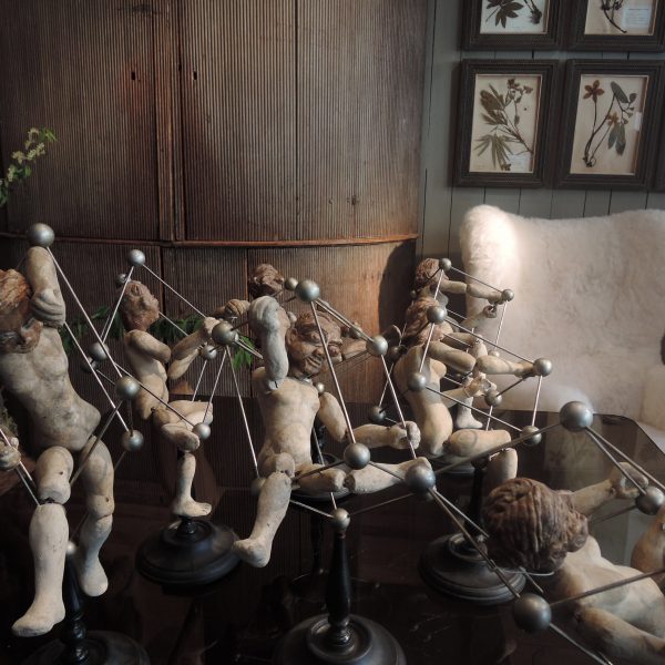 COLLECTION OF ITALIAN PUPPETS IN PLASTER MOUNTED ON STANDS
