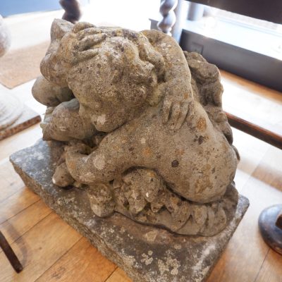 Group of children playing in carved stone 18th century