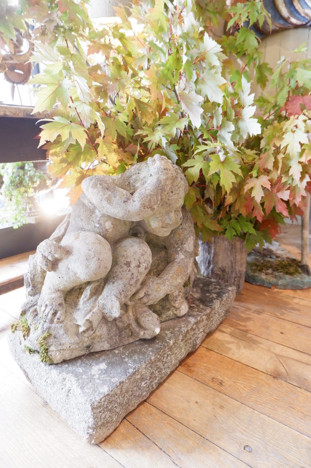 Group of children playing in carved stone 18th century
