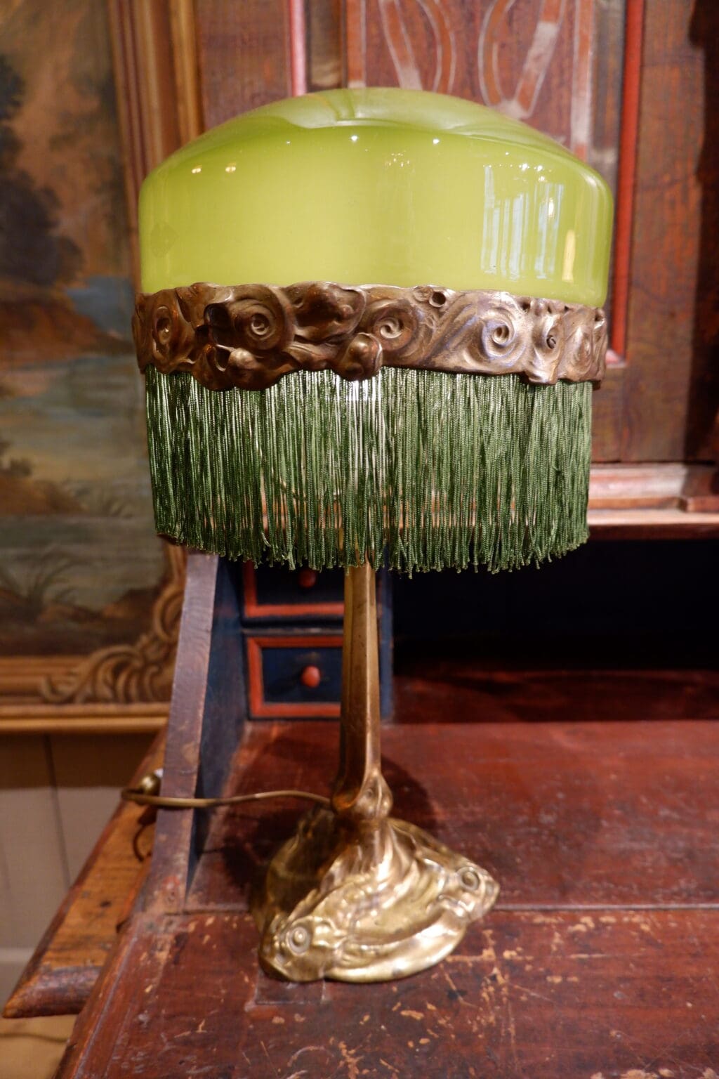 Table lamp with gilded bronze tritons and opaline glass - bladder green + fringe - Sweden ca.1910