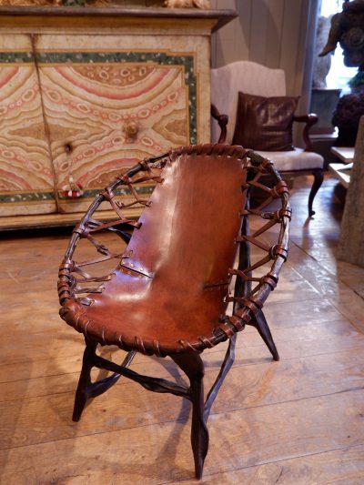 Metal and leather armchair with patina by Francois Thevenin