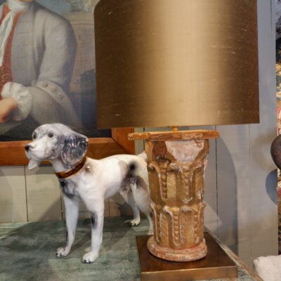 An antique gilded wood capital lamp + golden silk shade