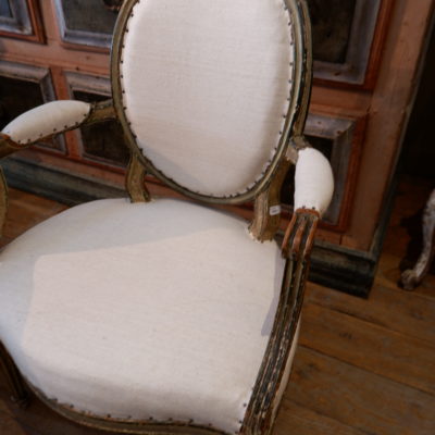 Pair of Louis XVI armchairs with oval medallion backs Green lacquer covered with old linen - France ca.1780