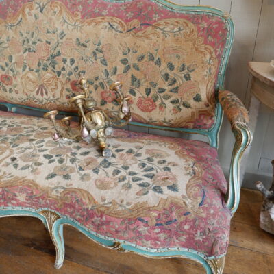 Large bench Louis XV covered with a tapestry in the small point decoration of roses ca.1800