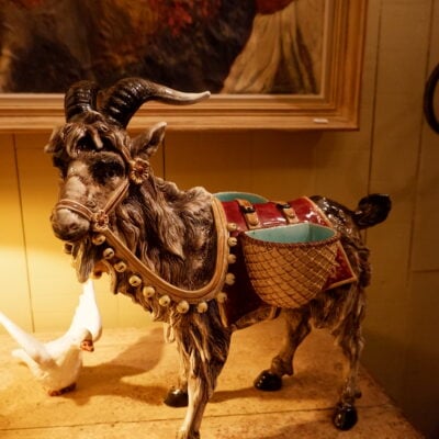 Goat in barbotine carrying baskets CA.1880