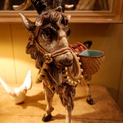 Goat in barbotine carrying baskets CA.1880