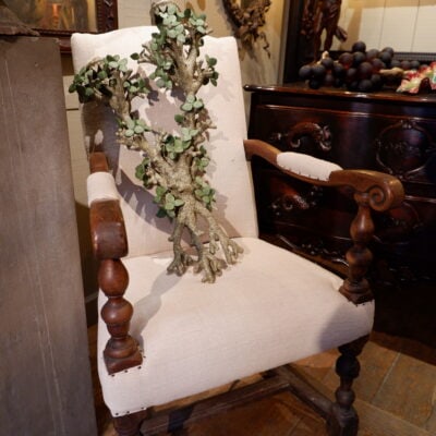 Louis XIII armchair in walnut covered with old linen
