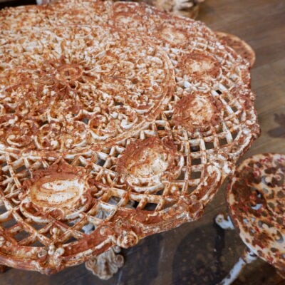 Pedestal table in cast iron, decorated with the 12 signs of the zodiac