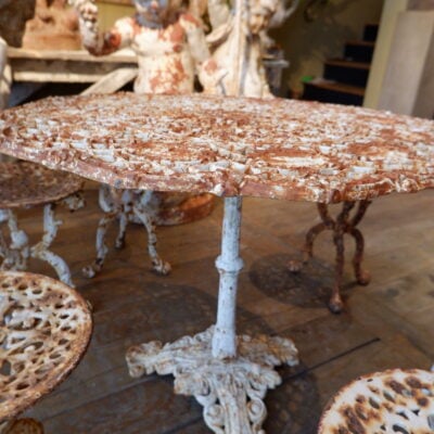 Pedestal table in cast iron, decorated with the 12 signs of the zodiac