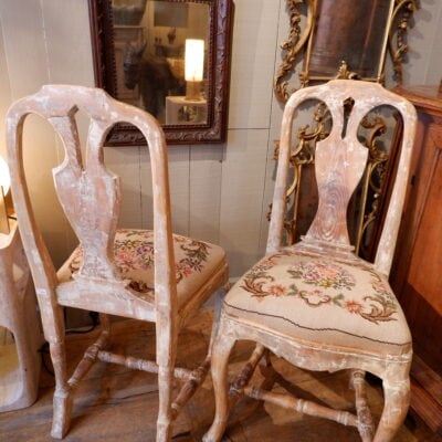 A pair of white patina chairs sitting in small point ca.1800