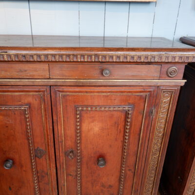 PAIR OF ITALIAN CARVED WALNUT SIDEBOARDS FROM THE 17TH CENTURY