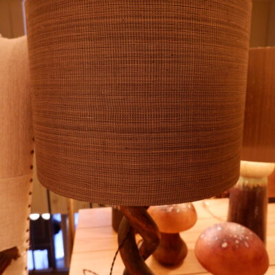 Pair of spiral lamps in blackened carved wood on birch root + A/J cylinder in raffia