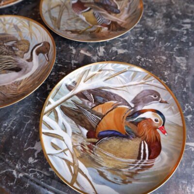 5 assiettes canards par Basil Ede, pour Franklin en porcelaine de Limoges