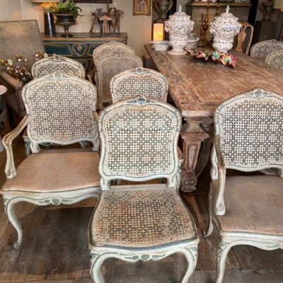 Suite of 6 chairs and 4 armchairs Louis XV period sitting in original caning and green lacquer.
