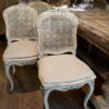 Suite de 6 chaises et 4 fauteuils période Louis XV assise en cannage -patine blanche & verte.