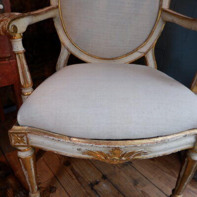 Elegant pair of 18th century frame armchairs in ivory lacquer and gold leaf