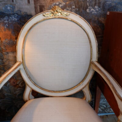 Elegant pair of 18th century frame armchairs in ivory lacquer and gold leaf