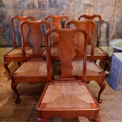 Suite of 6 finely carved walnut chairs & straw seat ca.1700