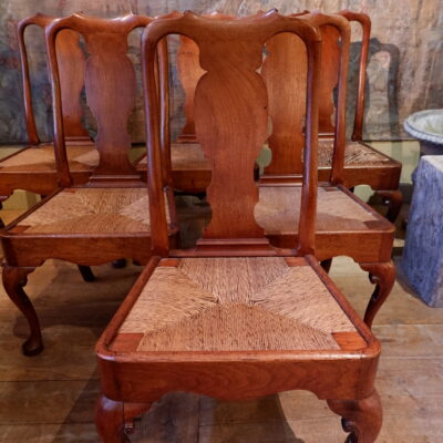 Suite of 6 finely carved walnut chairs & straw seat ca.1700