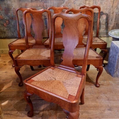 Suite of 6 finely carved walnut chairs & straw seat ca.1700