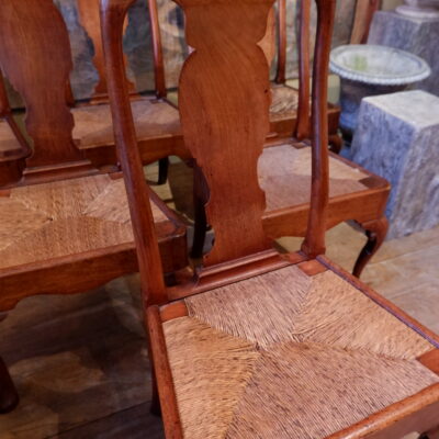 Suite of 6 finely carved walnut chairs & straw seat ca.1700