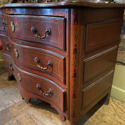 Oak Regency chest of drawers painted oxblood red and clog feet, France - southwest ca.1720