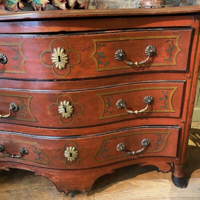 Oak Regency chest of drawers painted oxblood red and clog feet, France - southwest ca.1720