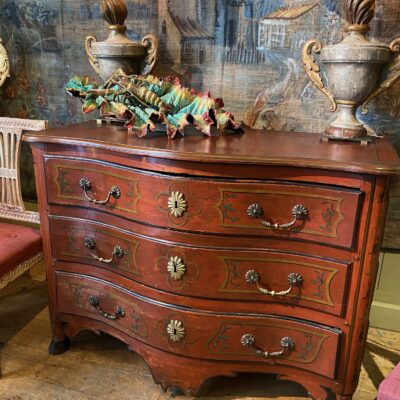 Oak Regency chest of drawers painted oxblood red and clog feet, France - southwest ca.1720