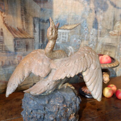 Painted cast-iron fountain center featuring a swan with spread wings on a rock late 19th century