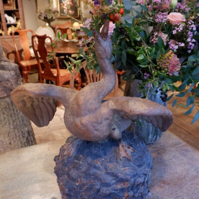 Painted cast-iron fountain center featuring a swan with spread wings on a rock late 19th century