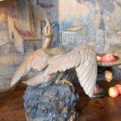 Painted cast-iron fountain center featuring a swan with spread wings on a rock late 19th century
