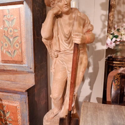Terracotta statue of a gardener with his shovel - France late 19th century