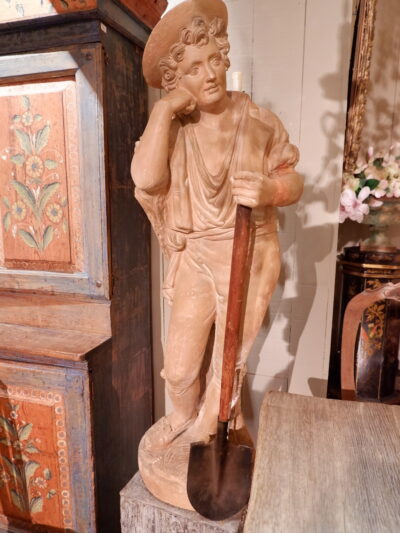 Terracotta statue of a gardener with his shovel - France late 19th century
