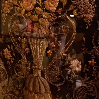 Large embroidered tulle veil depicting a vase and a large floral bouquet - gold thread and sequins ca.1800