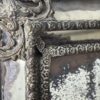 Grand miroir en métal repoussé