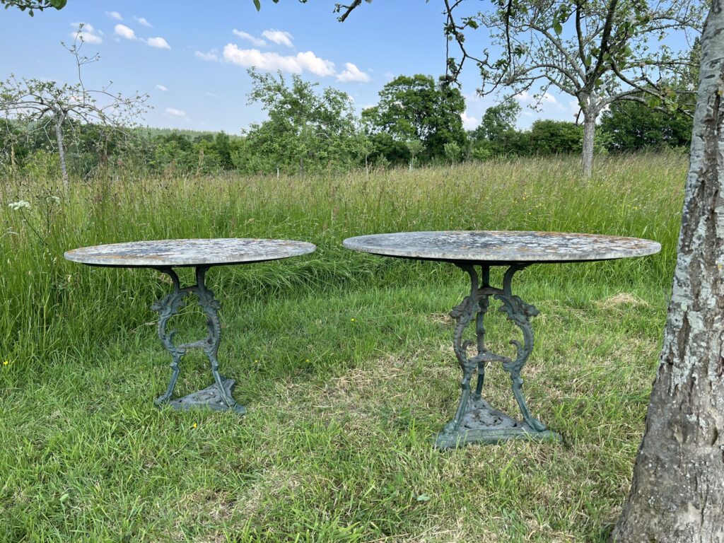 Pair of oval garden pedestal tables