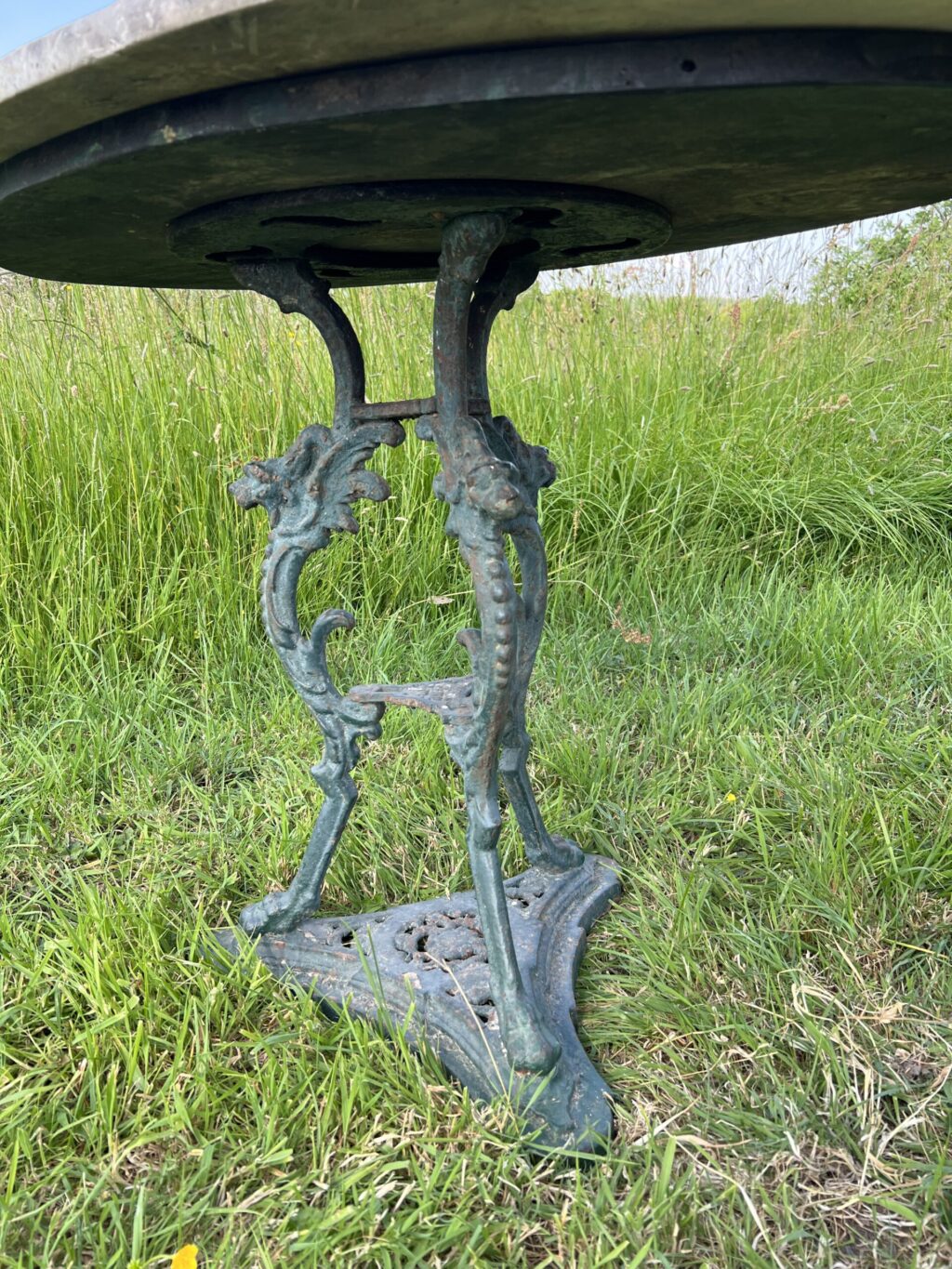 Pair of oval garden pedestal tables