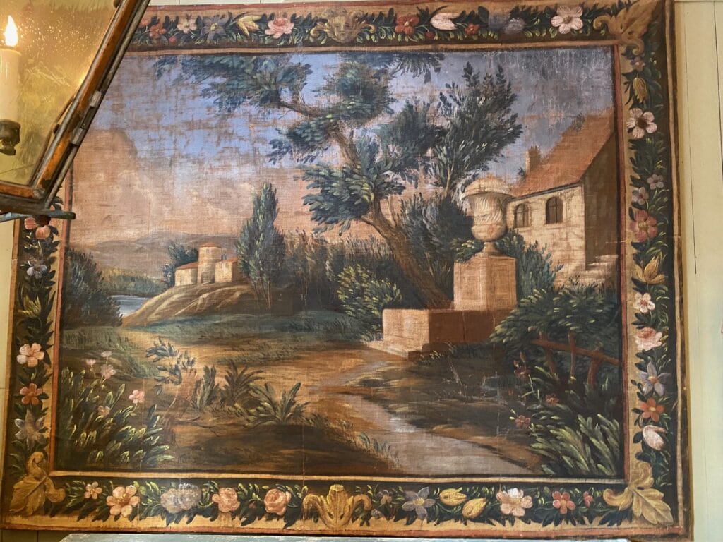 Grande toile peinte "Paysage de Provence" et bordure fleurie - montée sur chassis bois- France XVIIIe
