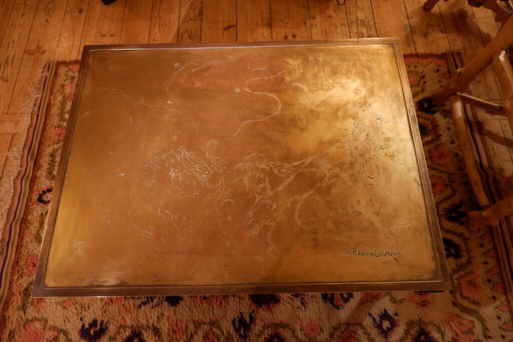 Table basse de Philip & Kelvin LAVERNE en laiton et bronze à décor gravé de "Poséidon sur son char marin " ca.1960