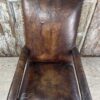 Fauteuil italien en cuir marron patiné style LOUIS XIII