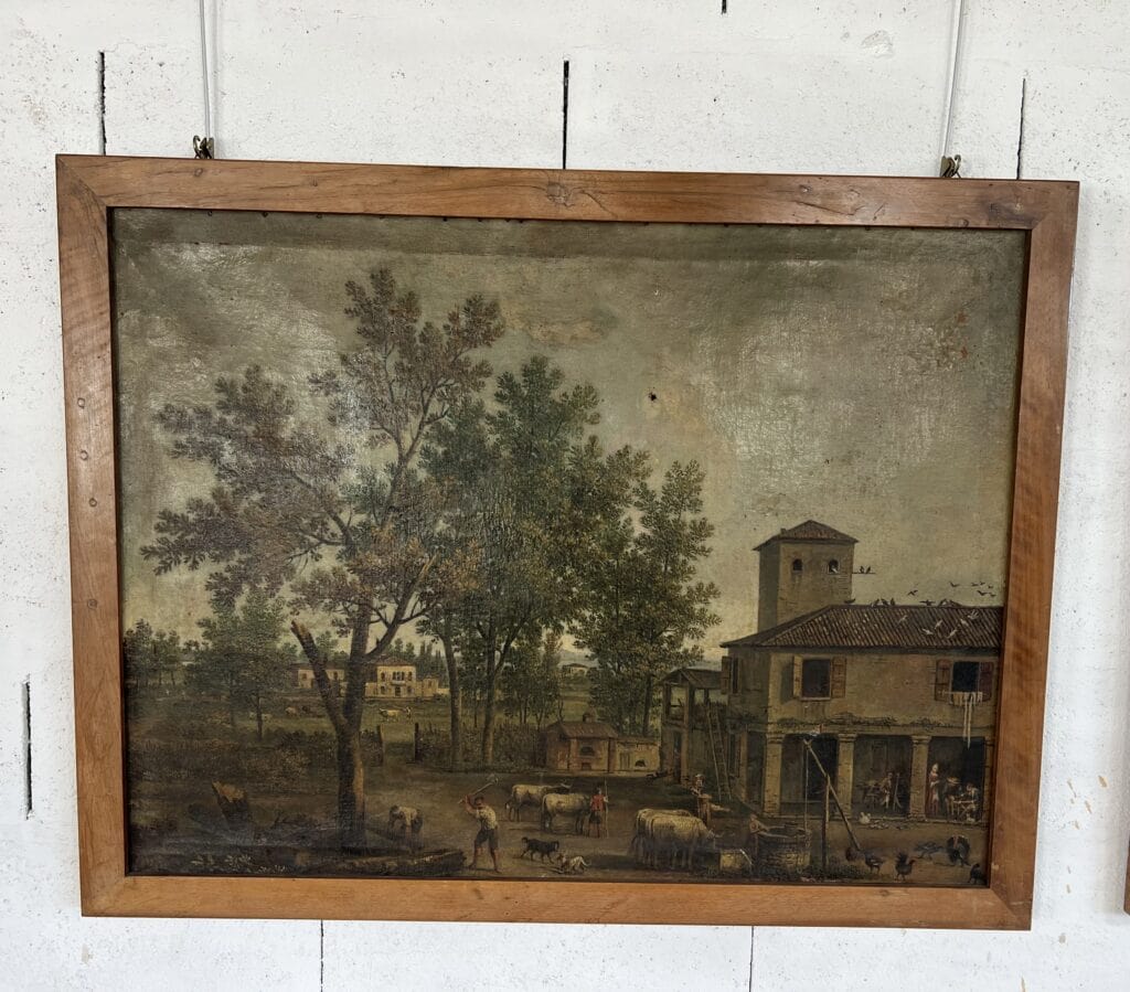Paire de tableaux italiens anciens représentant des paysages ruraux animés et chasseurs, encadrés en bois de chêne