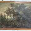 Paire de tableaux italiens anciens représentant des paysages ruraux animés et chasseurs, encadrés en bois de chêne