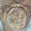 Suite de trois grands vases en terracotta patinée à décor de médaillons classiques de style XVIIIe